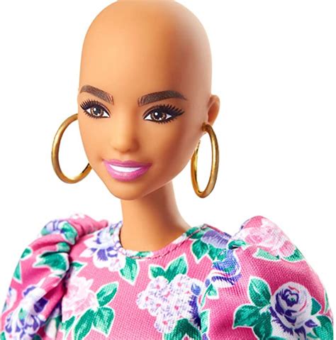 Bald barbie - The new, bald Barbie – officially a "friend" of Barbie's – who will come with wigs, hats and head scarves, was further proof that the all-American blonde was evolving, the Vatican paper stated ...
